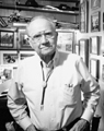 Ike Hamilton Auctioneer in his study, 1992
