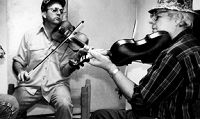 Larry "Bubba" Frey with master fiddler Harry Lafleur.