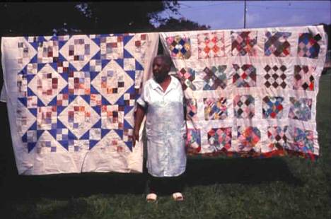 Mary Lou Gunn of Ruston airs her quilts on a clothesline.